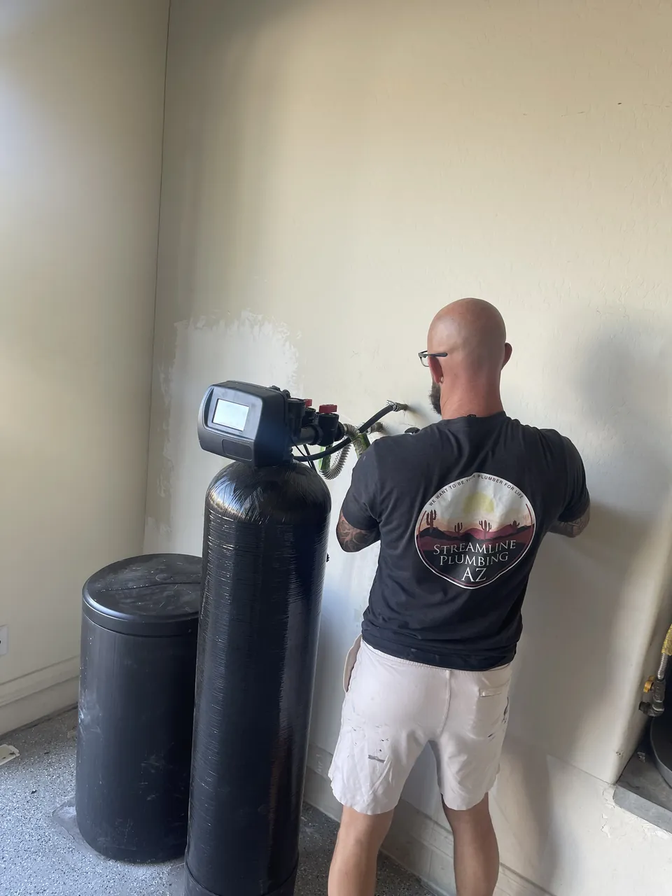 Rich Woyak installing a water softener system